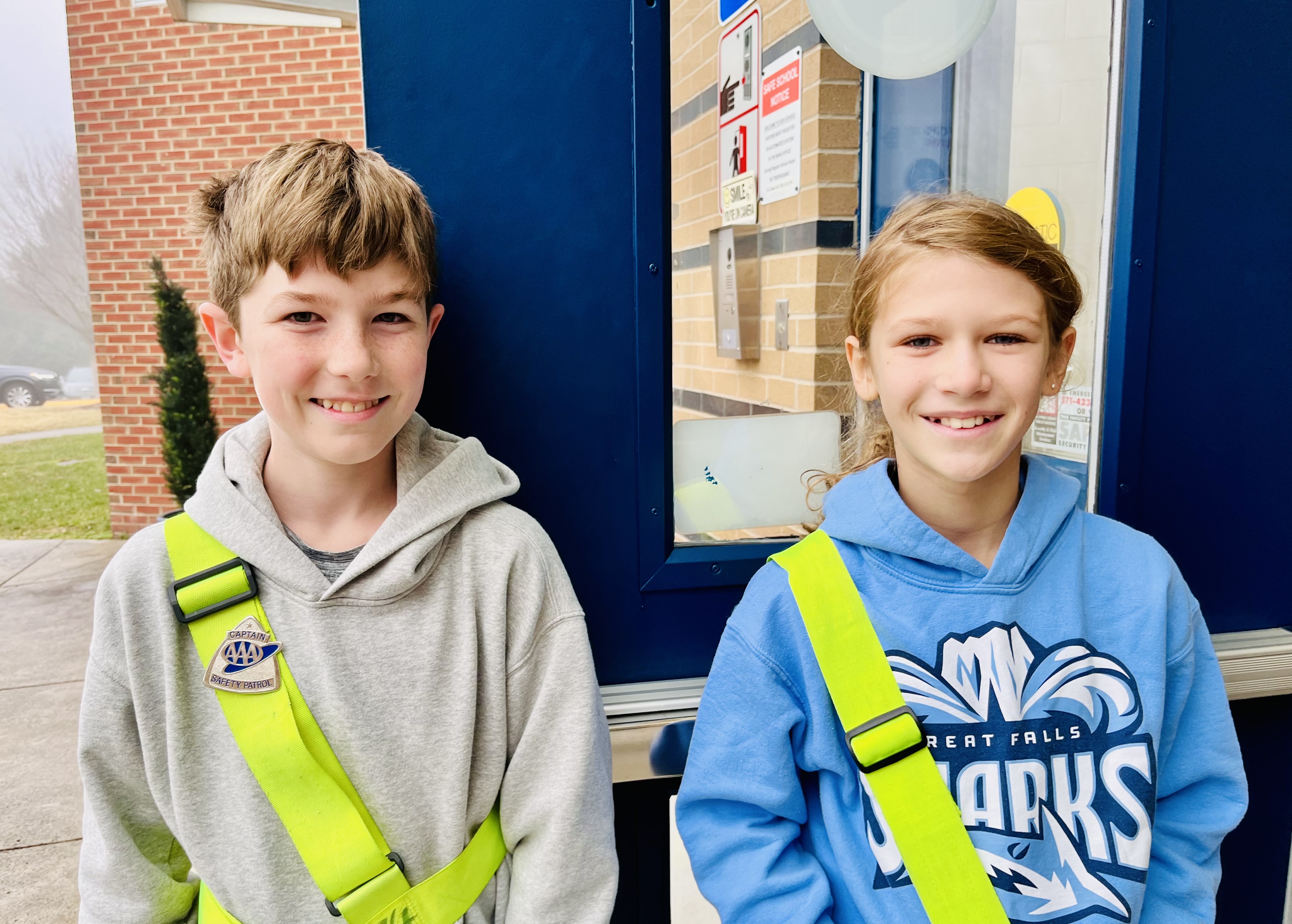 Safety Patrols wait for students to arrive